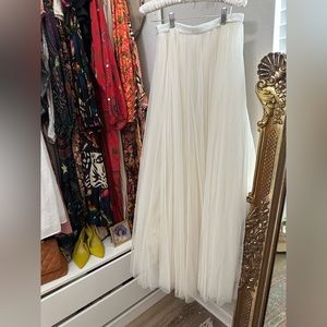 Needle and thread bridal skirt.